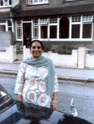 Khallaji Najma in front of her London house,