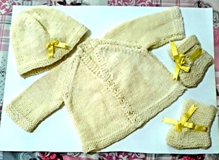 the set has a cap, sweater and booties. I chose beige and yellow.It is ideal for a new born baby